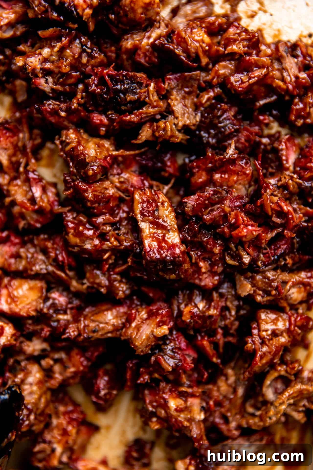 Pulled Pork BBQ Sandwiches 6 Perfectly smoked beef, expertly chopped and thoroughly coated with BBQ sauce, ready to be assembled into delicious sandwiches.