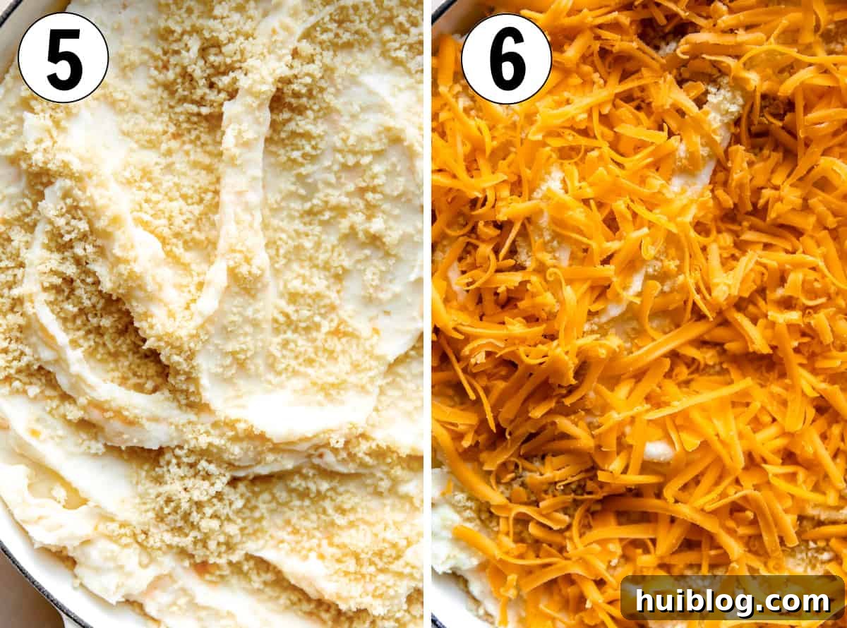 Preparing a casserole by spreading out mashed potatoes, topping with toasted panko and then shredded cheese. 