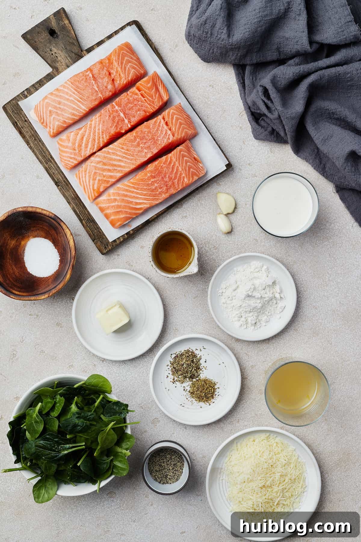 Pan-Seared Salmon with Creamy Spinach 4 From top left: salmon fillets, garlic, heavy cream, salt, butter, olive oil, flour, dried herbs, chicken broth, spinach, pepper, Parmesan cheese