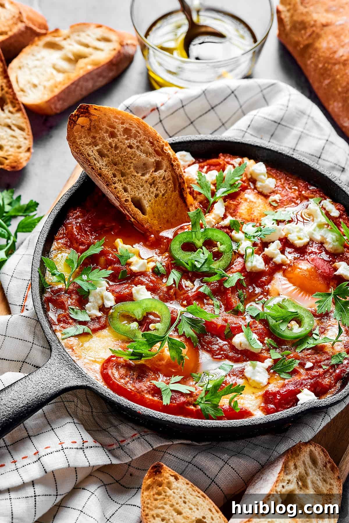 Homemade eggs in spicy tomato sauce.