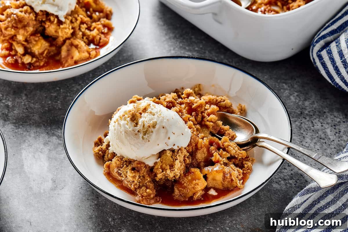 Apple crisp a la mode, in dessert plates.
