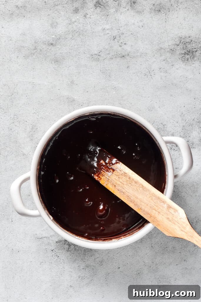 No-Bake Chocolate Crispy Treats 5 A rich, glossy chocolate marshmallow mixture, perfectly ready to be combined with crispy rice cereal.