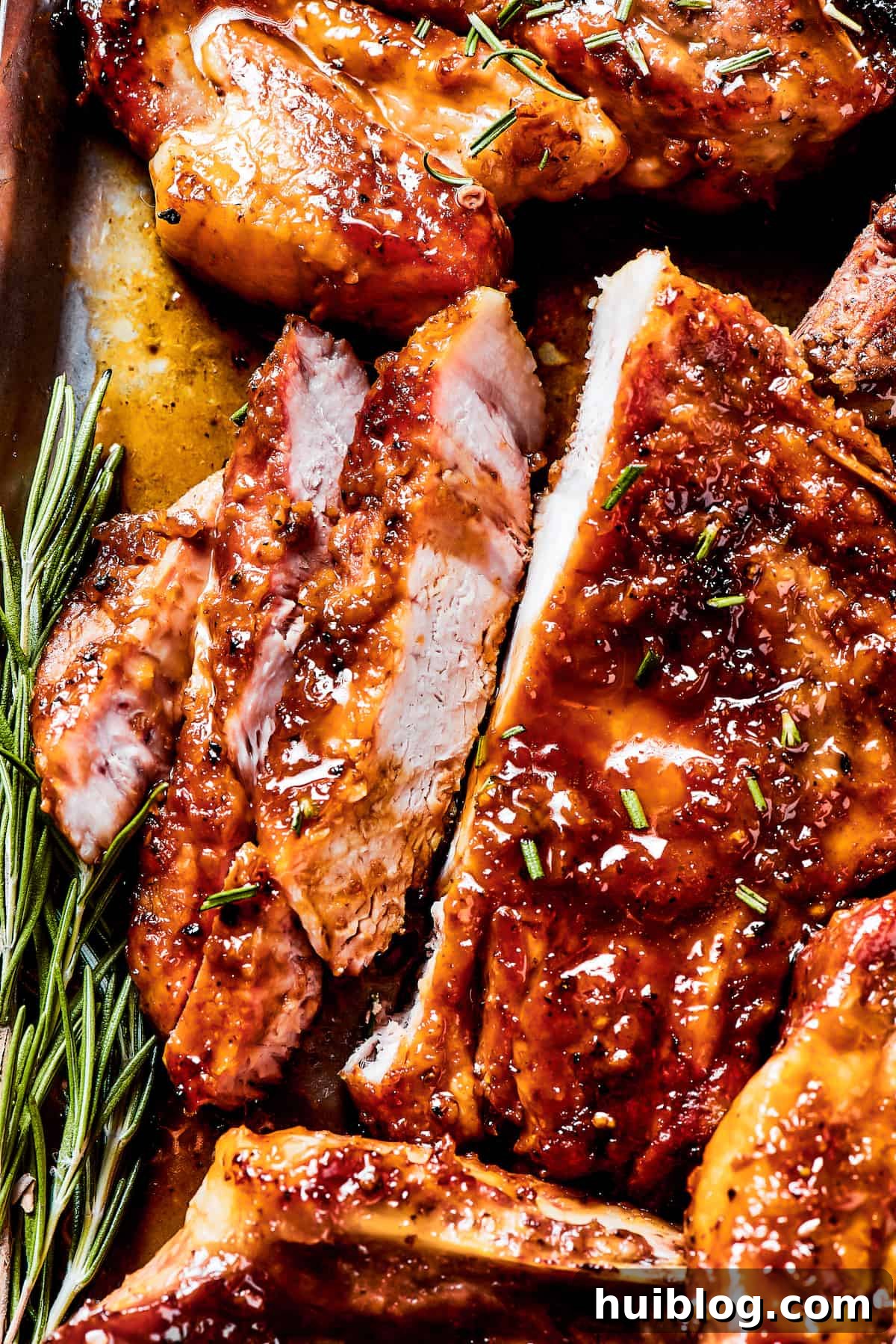 Gorgeous Brown Sugar Pork Chops may look fancy, but they are actually so simple to make! Savory, pan-fried chops with brown sugar glaze. A perfectly cooked brown sugar pork chop, sliced in half to reveal its juicy, tender interior.