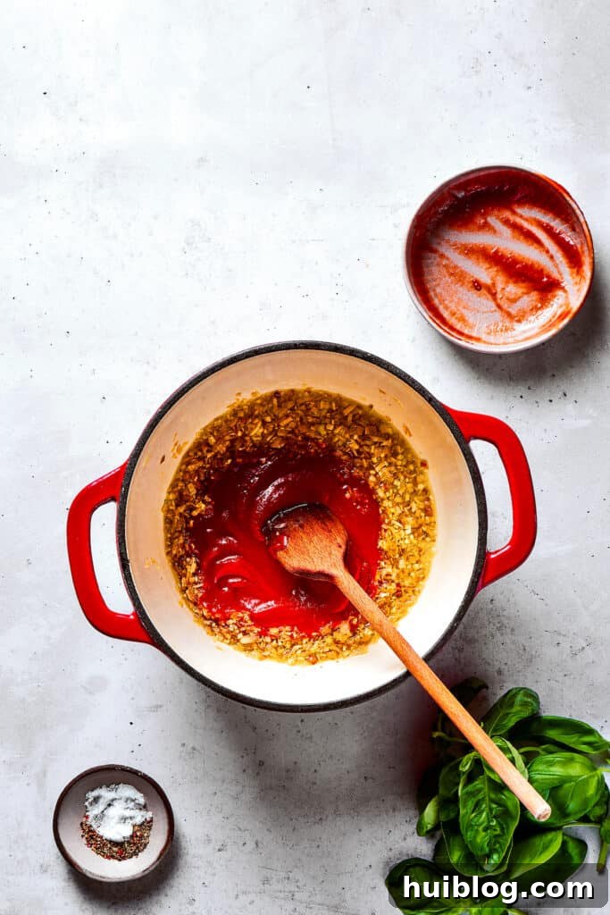 Gigi Hadid's Popular Pasta: Vodka Optional 6 Sauteing concentrated tomato paste with aromatics, bringing out its rich flavors.