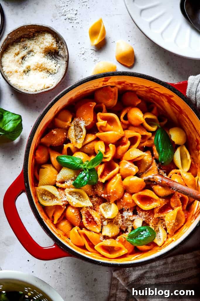 Gigi Hadid's Popular Pasta: Vodka Optional 10 A pot of perfectly cooked pasta shells coated in the creamy tomato sauce, ready to be served.