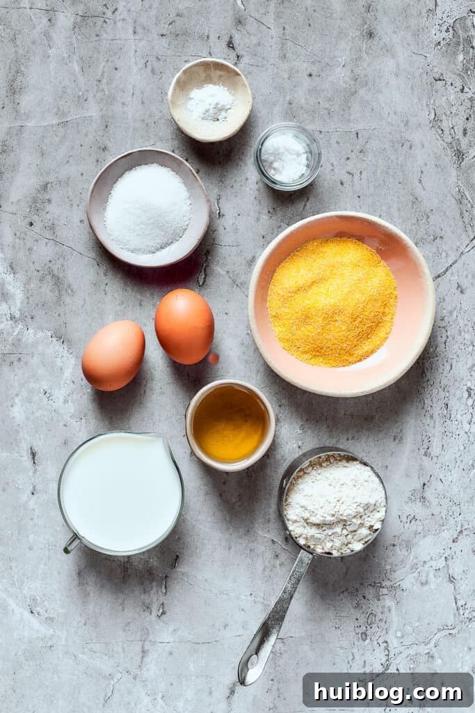 Cornbread ingredients measured and arranged on a work surface.
