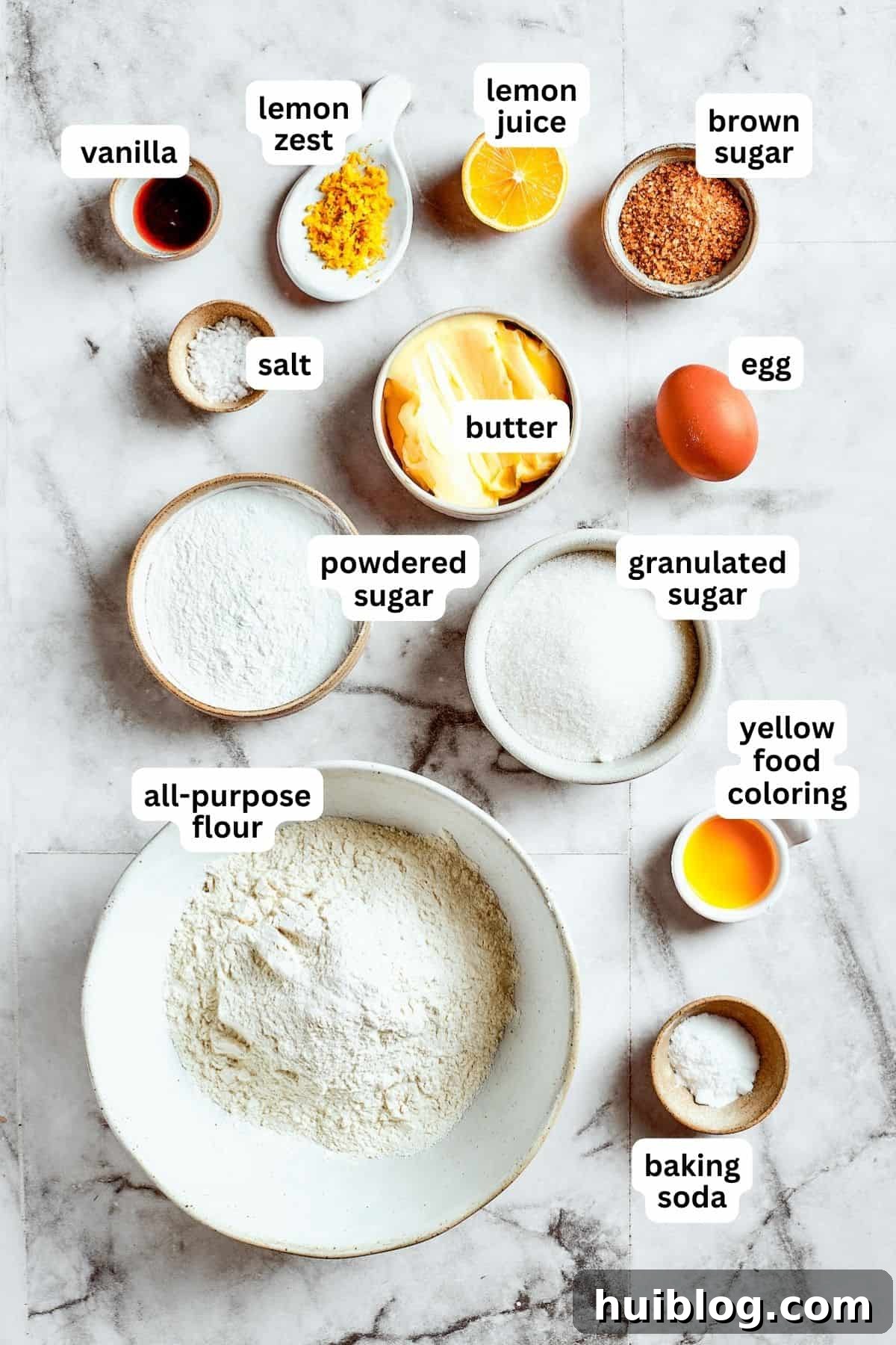 Lemon cookies are tender, soft, moist, and chewy, with tart and tangy fresh lemon flavor balanced by rich brown sugar and smooth vanilla. Aerial view of all the ingredients used to make lemon cookies.