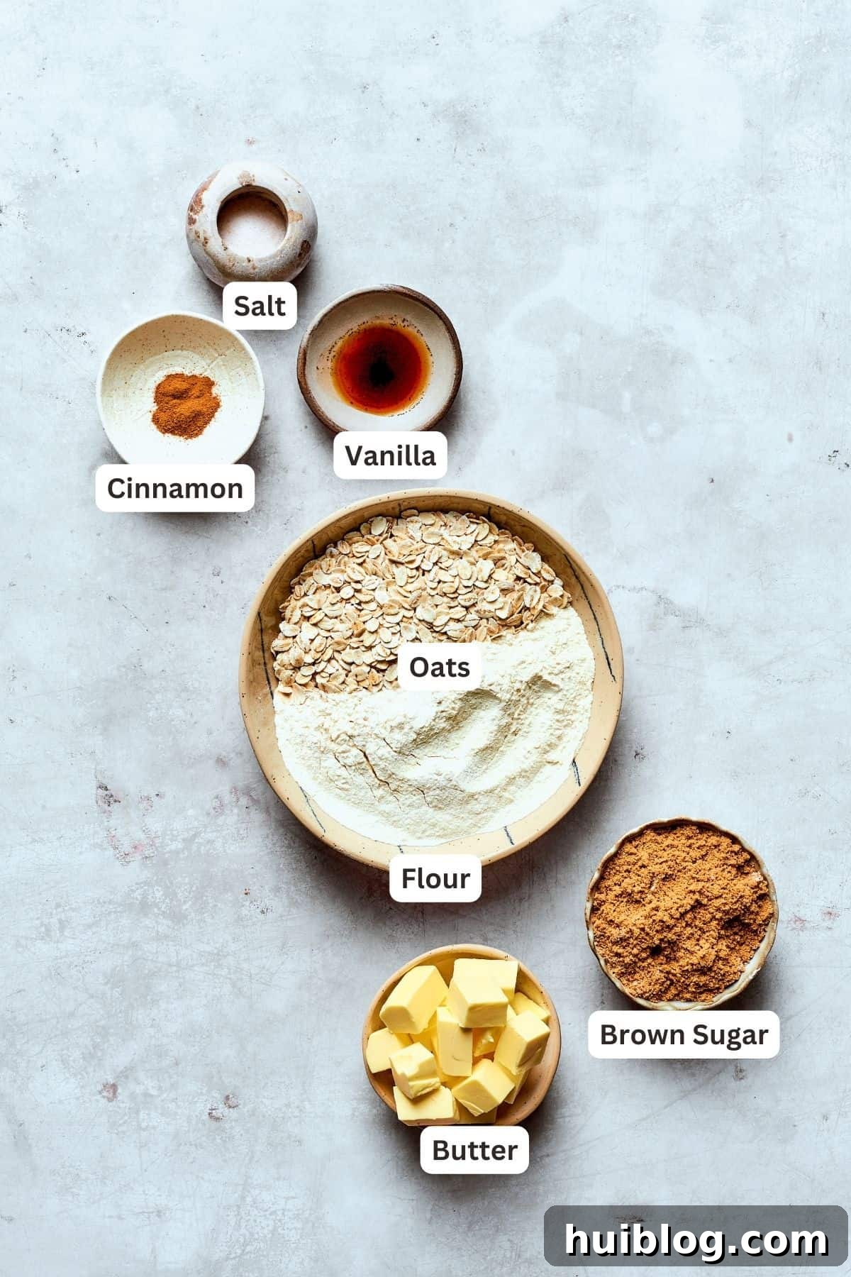 Blueberry crisp topping ingredients are shown labeled: cinnamon, vanbilla, salt, flour, oats, butter, brown sugar.