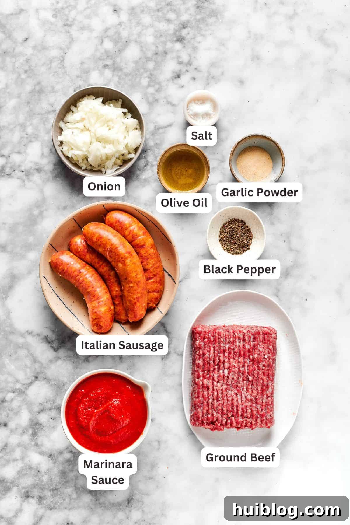 Ingredients for million dollar spaghetti laid out on a counter.