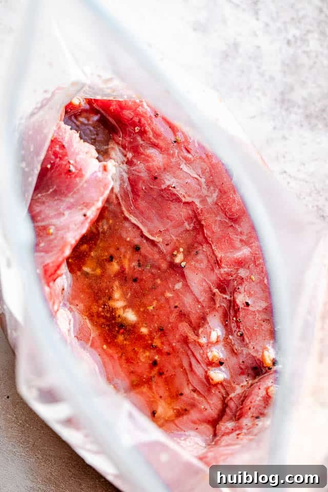 steak in marinade inside ziploc bag