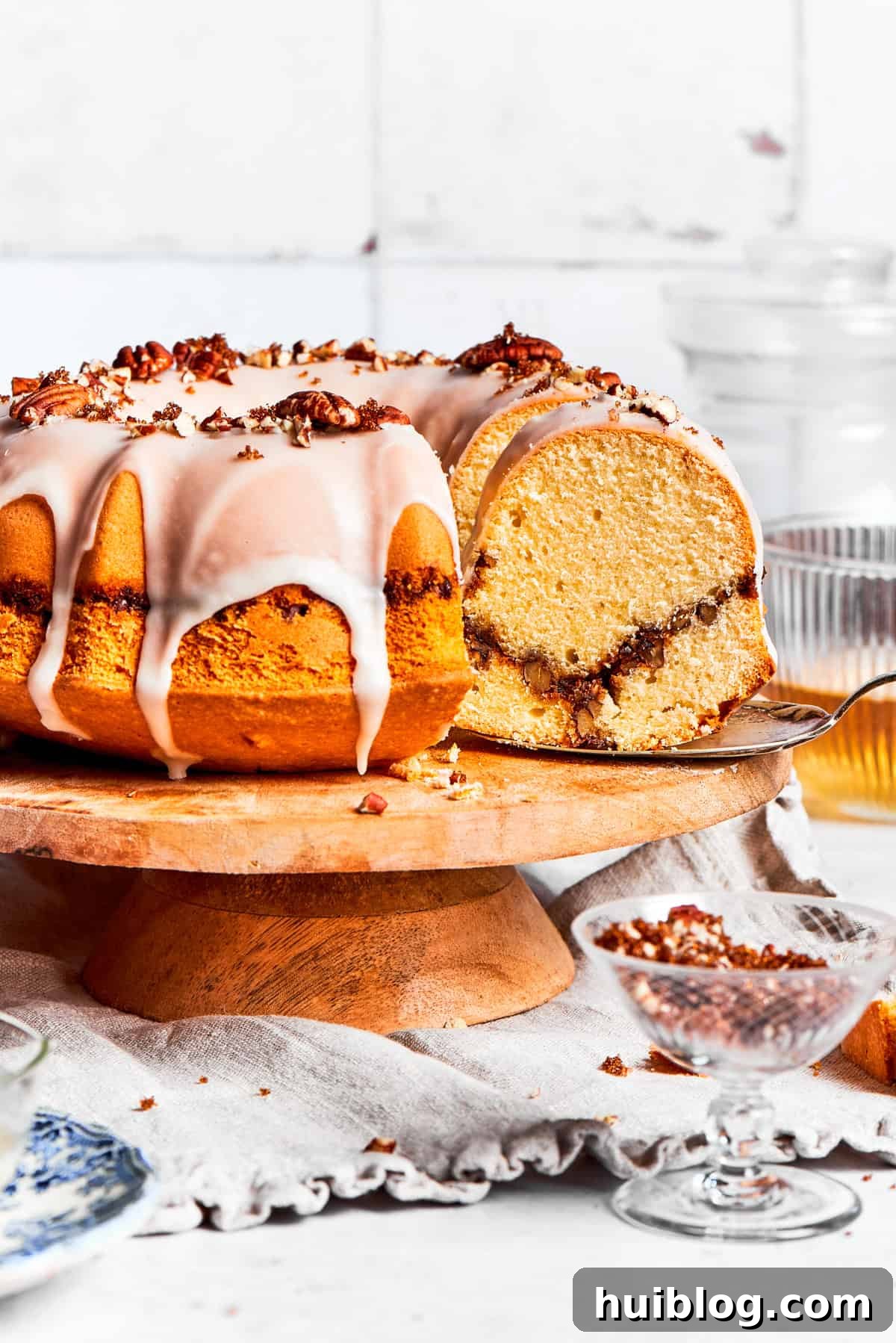 Glazed sock it to me cake on a plate.