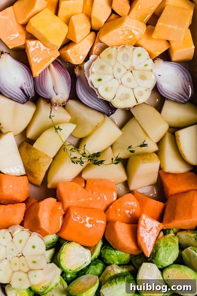 Chopped carrots, brussels sprouts, potatoes and butternut squash.