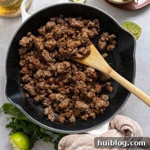 Chipotle ground beef in a skillet.