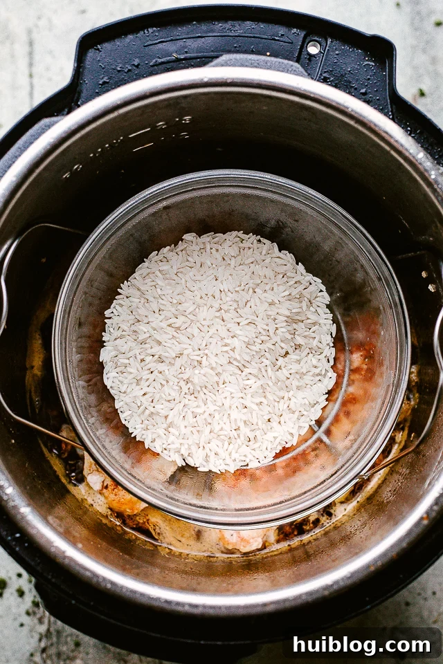 Placing a dish of rice in an Instant Pot to cook.