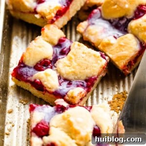 Pan of Cherry Kuchen Bars Topped with Glaze
