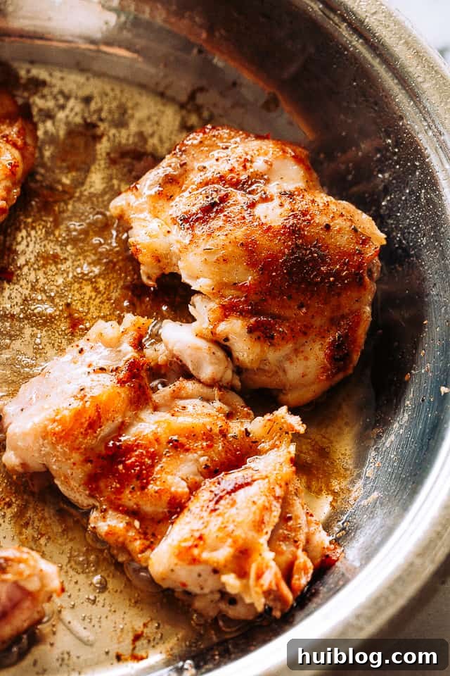 Juicy, tender, and flavorful, these pineapple barbecue chicken thighs are one of my favorite easy weeknight dinner ideas! Done in 20 minutes! Browning boneless skinless chicken thighs