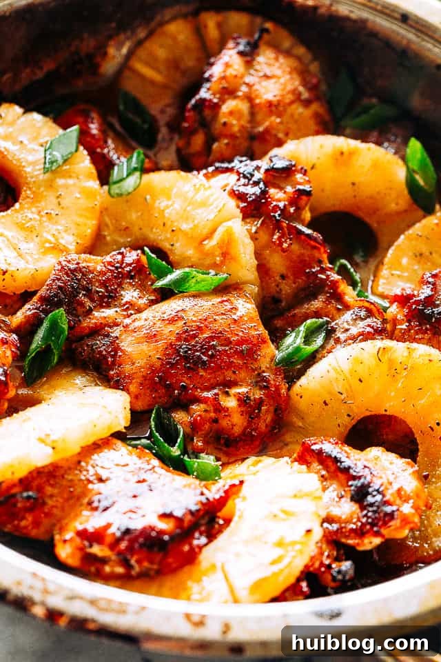 Juicy, tender, and flavorful, these pineapple barbecue chicken thighs are one of my favorite easy weeknight dinner ideas! Done in 20 minutes! Chicken thighs finished in a pineapple BBQ sauce.