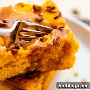 fork cutting into a pumpkin pancake