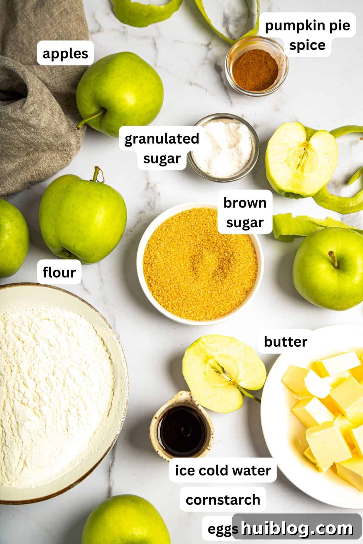An image of ingredients used to make a homemade apple pie.