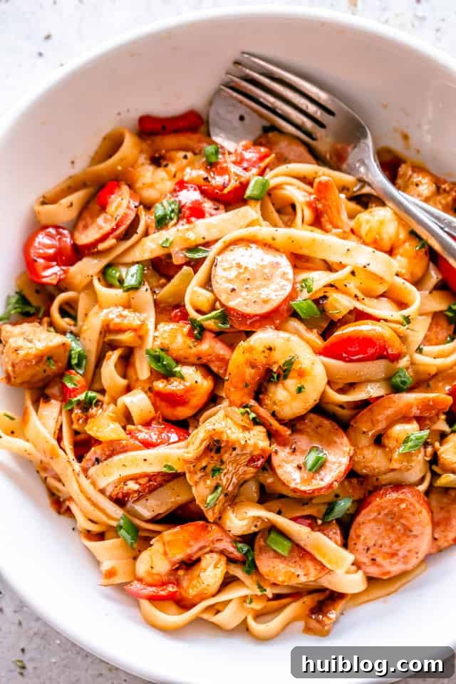 One Pot Jambalaya Pasta presented in a white serving dish, ready to be enjoyed.