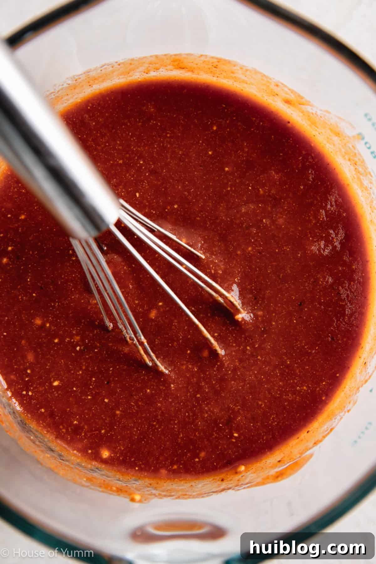 Effortless Slow Cooker BBQ Pulled Chicken 7 BBQ sauce in a measuring cup after whisking together.